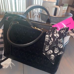 Black skull purse by Betsy Johnson